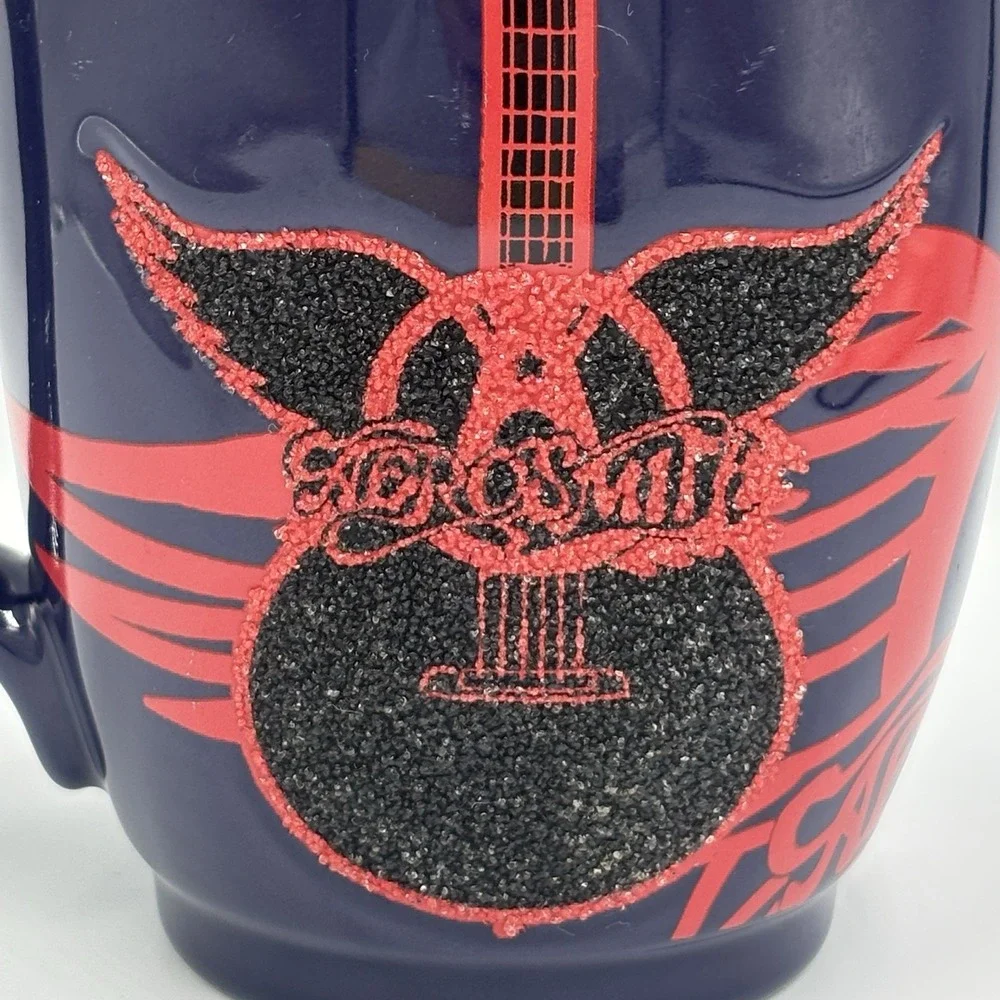 DISNEY'S ROCK 'N ROLLERCOASTER AEROSMITH GUITAR WINGS‎ COFFEE MUG.